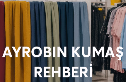 Farklı renklerde ayrobin kumaşların mağaza içinde sergilendiği Ayrobin Kumaş Rehberi kapak görseli.